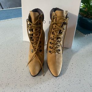 Manolo Blahnik boots.